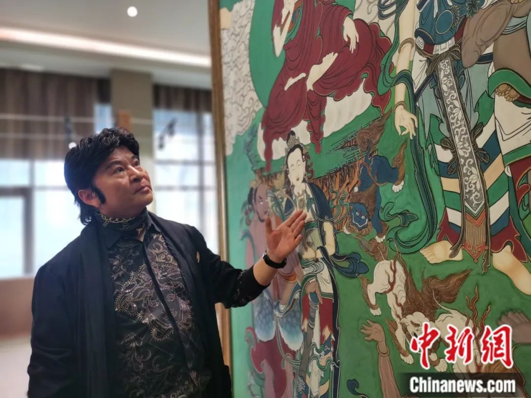 國家一級美術(shù)師劉觖。張?zhí)砀?攝