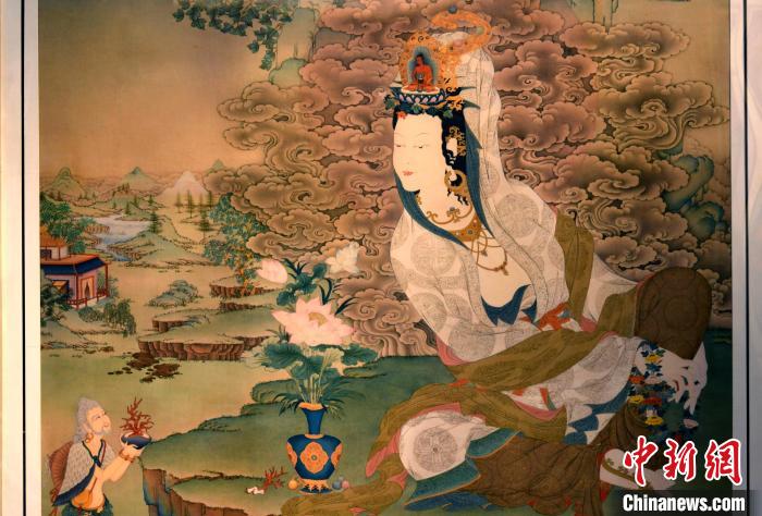 圖為5月16日，展覽中新創(chuàng)唐卡作品《靜息觀音》(局部)。　李林 攝